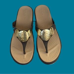 CROCS Brown Sandals w/Shiny Gold Embellishments. W 7 Like New